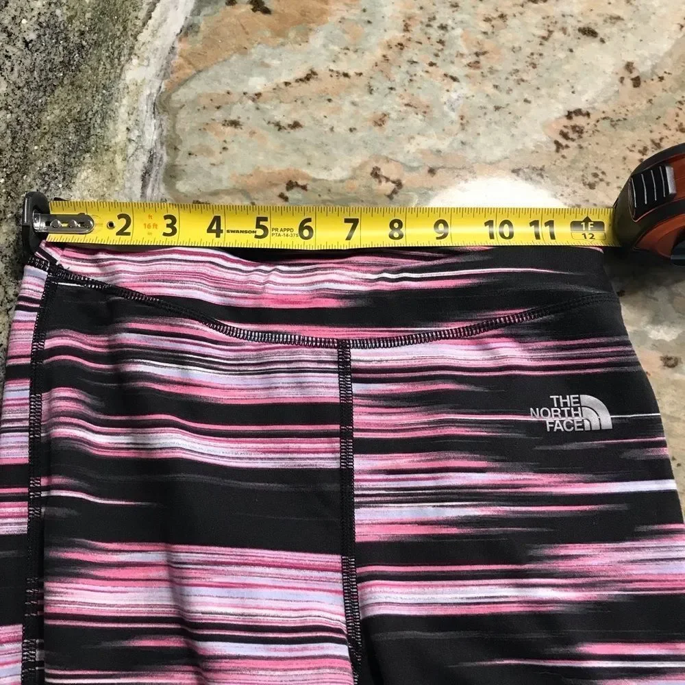 The North Face Leggings in black and pink